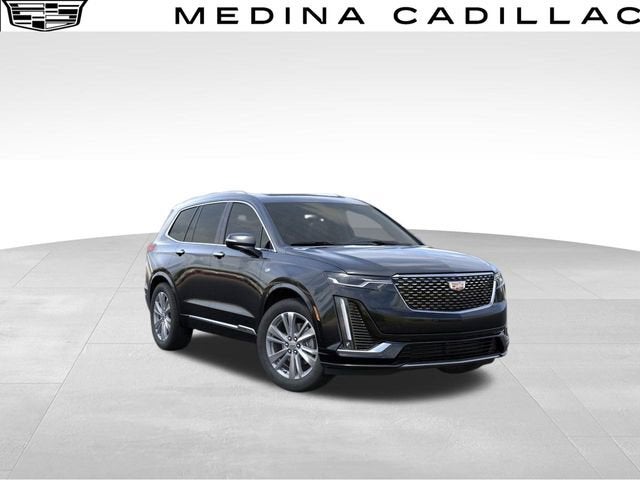 2025 Cadillac XT6 Premium Luxury in Stellar Black Metallic — front three-quarter view