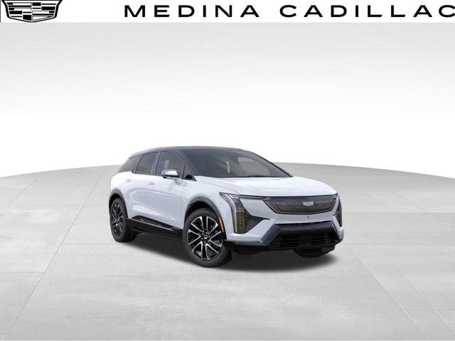 2026 Cadillac OPTIQ Sport in Vibrant White Tricoat — front three-quarter view