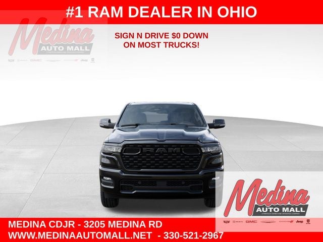2026 RAM 1500 Big Horn/Lone Star in Diamond Black Crystal Pearl-Coat Exterior Paint — front three-quarter view