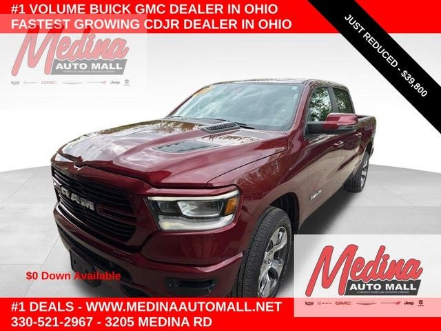 2023 RAM 1500 Laramie in Delmonico Red Pearlcoat — front three-quarter view