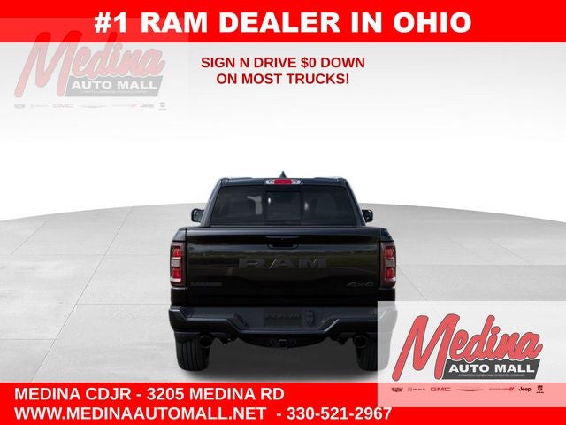 2026 RAM 1500 Laramie in Diamond Black Crystal Pearl-Coat Exterior Paint — front three-quarter view