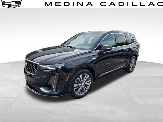 2024 Cadillac XT6 Premium Luxury in Stellar Black Metallic — front three-quarter view