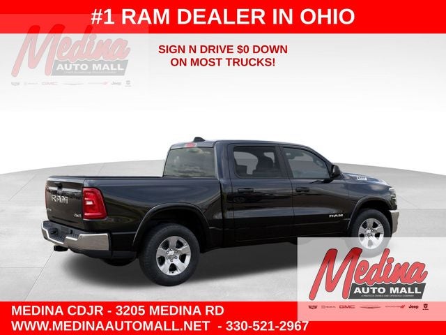 2026 RAM 1500 Big Horn/Lone Star in Diamond Black Crystal Pearl-Coat Exterior Paint — front three-quarter view
