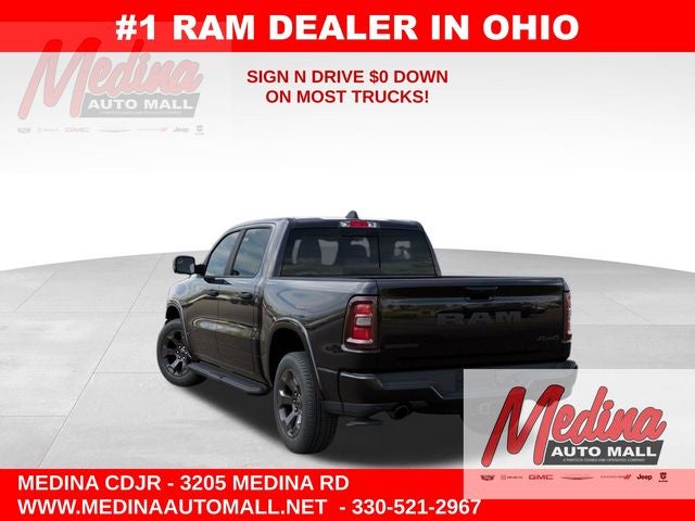 2026 RAM 1500 Big Horn/Lone Star in Diamond Black Crystal Pearl-Coat Exterior Paint — front three-quarter view