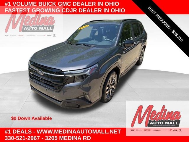 2025 Subaru Forester Touring in Magnetite Gray Metallic — front three-quarter view