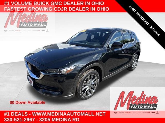 2019 Mazda Mazda CX-5 Signature in Jet Black Mica — front three-quarter view